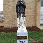The statue that was vandalized. 